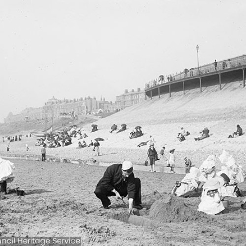 People playing on the beach