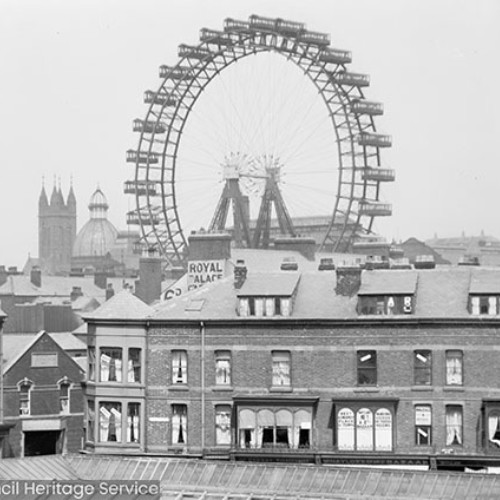 Ferris wheel and rooves of buildings