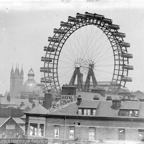 Ferris wheel and rooves of buildings
