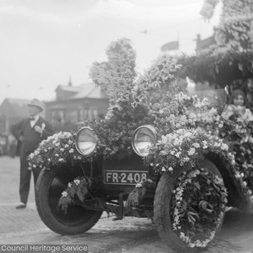 Car decorated in carnival flowers