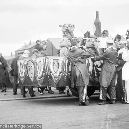 People in costume on carnival float