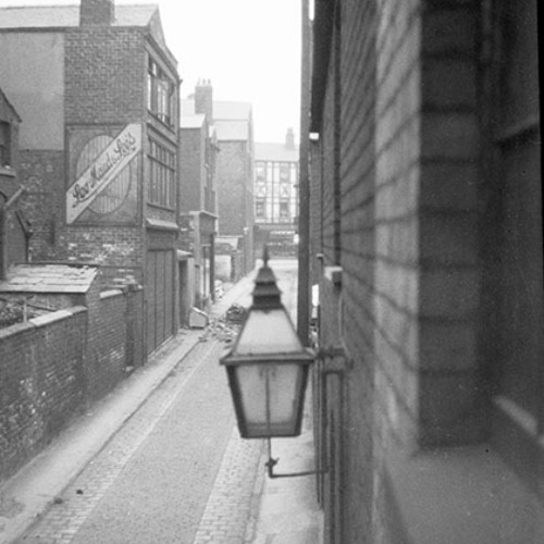 Street scene with close up of lamps