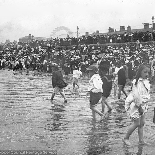 Children paddling in the sea