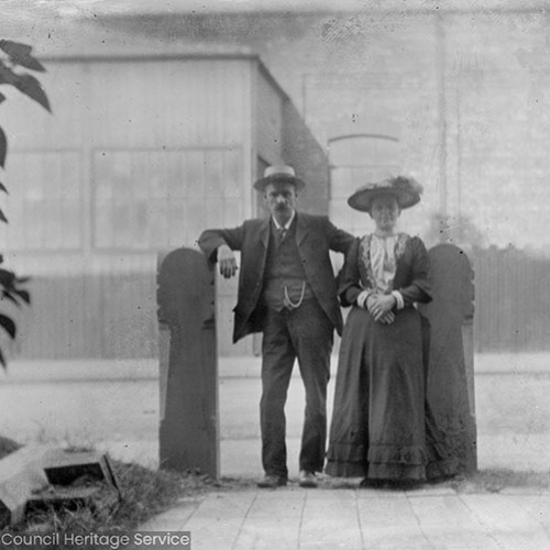Man and woman standing in street
