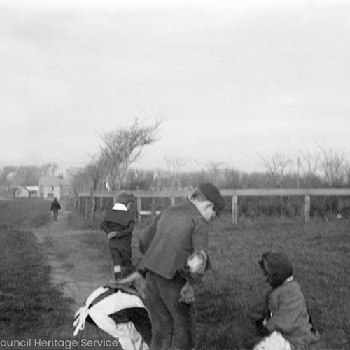 Children playing in field