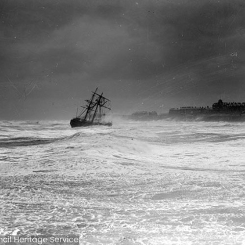 Sailing ship in stormy seas