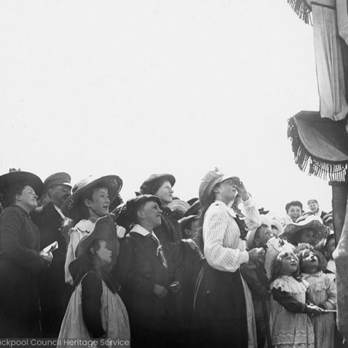 Children watching a Punch and Judy show