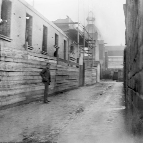 Man standing in alley