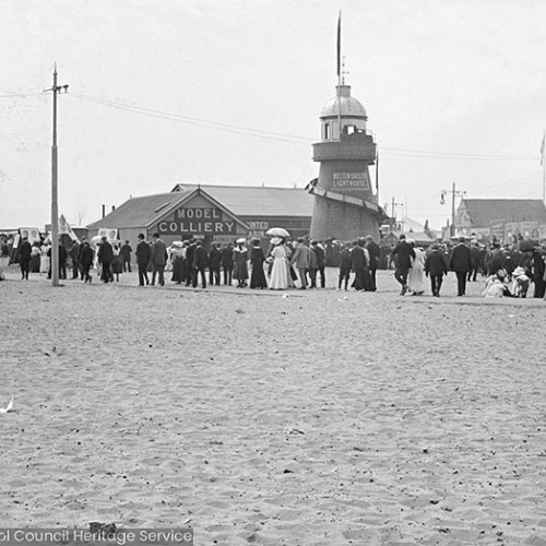 Crowds on a helter-skelter on the beach