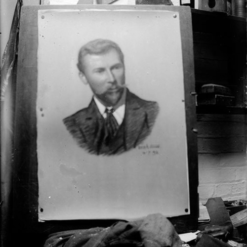 Portrait painting of a bearded young man