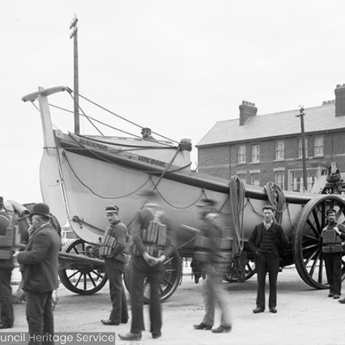 Crew in front of Lifeboat on wagon