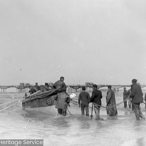 Crew launching Lifeboat into waves