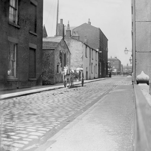 Street scene with horse and cart