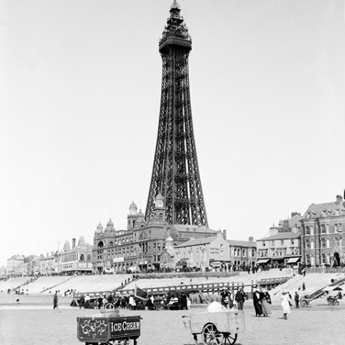 Blackpool Tower and carts on the beach
