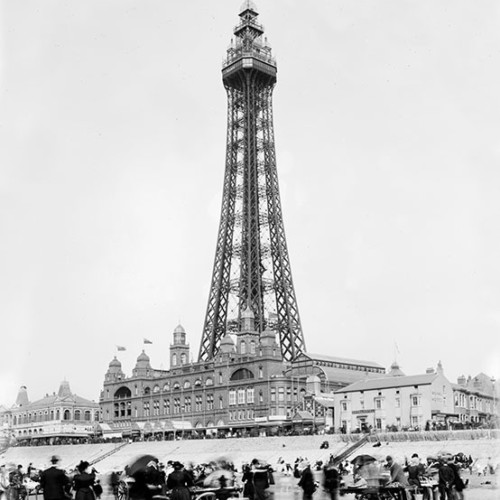 People on the beach in front of Blackpool Tower