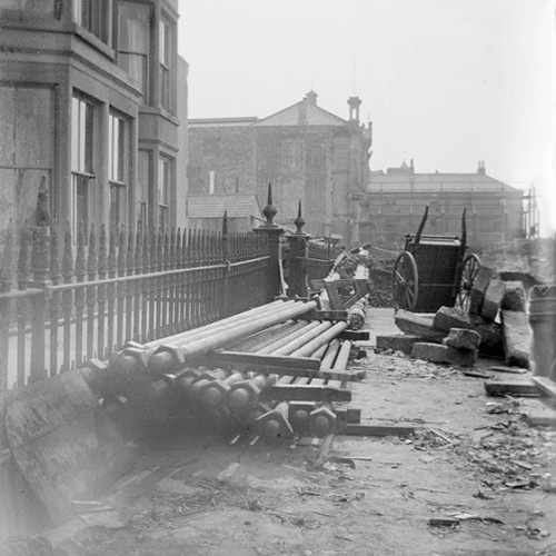 Piles of metalwork on a building site