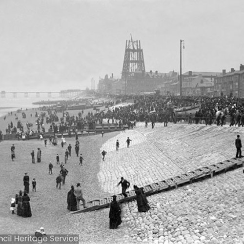 Crowds on beach watching Lifeboat