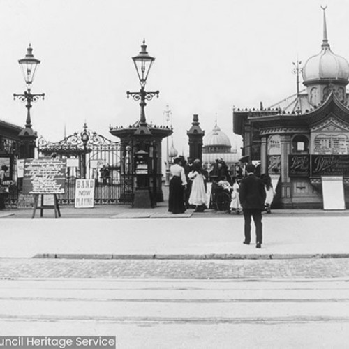 People walking into the entrance of Blackpool North Pier