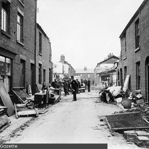 Debris and household items out on the street.