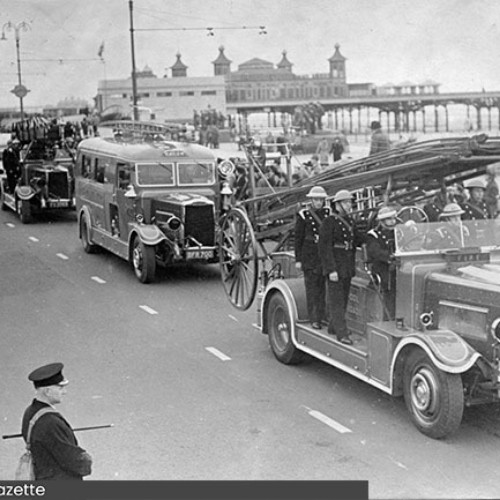 Civil Defence vehicles including fire engines parading on the Promenade.