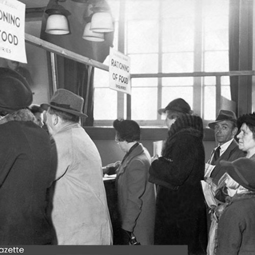 Rationing of Food Counter with a queue of people.