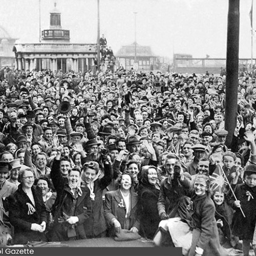 Large crowd filling the square.