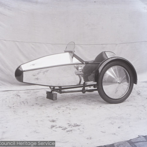 Side view of a motorcycle sidecar.