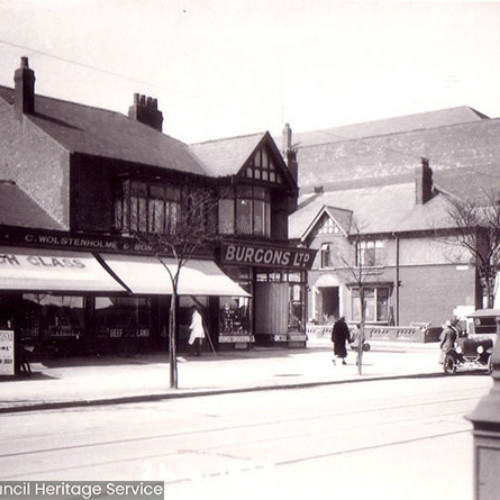 Street scene with two shop buildings.