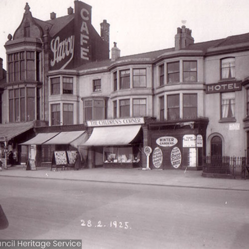 Street scene with parade of shops.