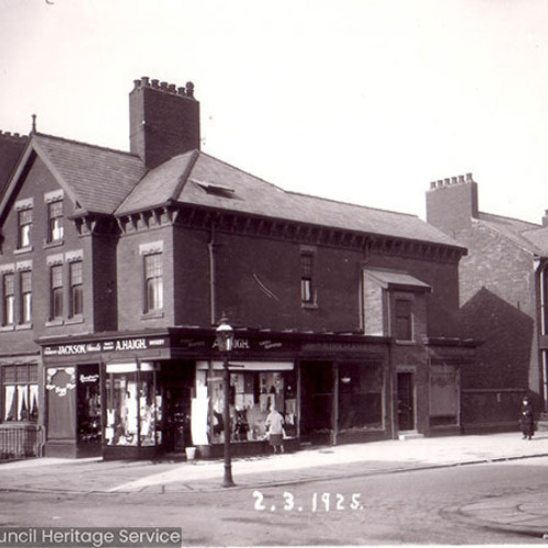 Street scene with houses and a shop.