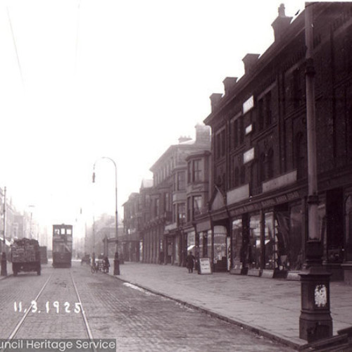 Street scene with parade of shops.