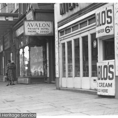 Shop fronts and a sign for the Avalon Private Hotel.