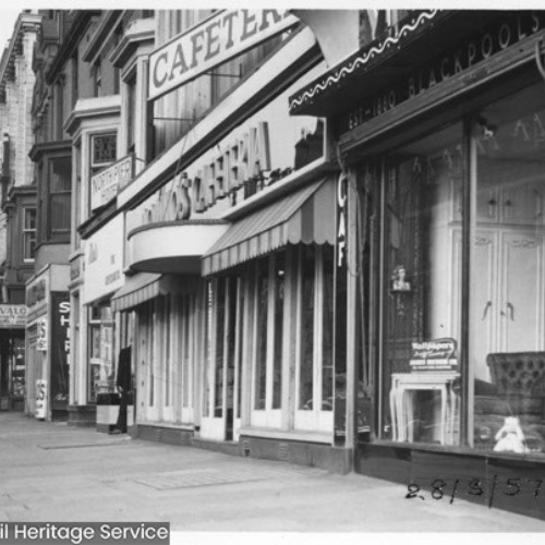 Shop fronts, including a Cafeteria.