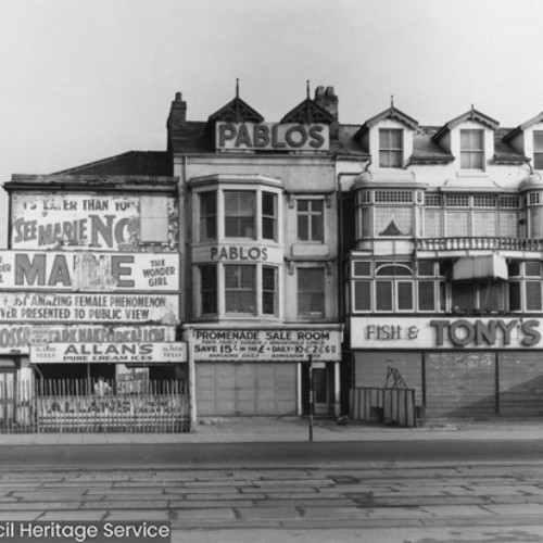 Exterior of a group of buildings including Allan's Ices, Pablo's and Tony's Fish and Chips.