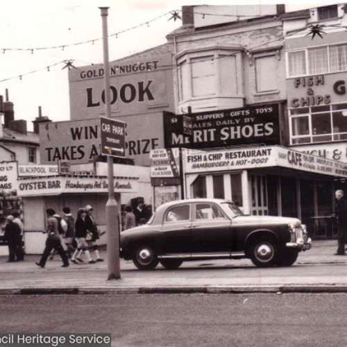 Multiple shops and stalls including Golden Nugget, Palace Rock Co Ltd, Oyster Bar, Merit Shoes and G. O'Hagan's Fish and Chips.