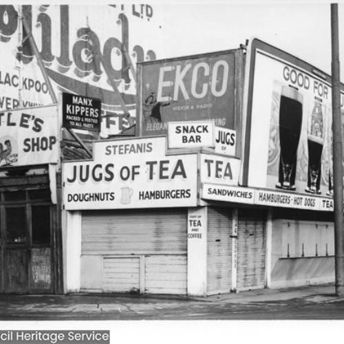 Multiple stalls including Little's Kipper Shop and Stefanis Snack Bar advertising Jugs of Tea and other refreshments.