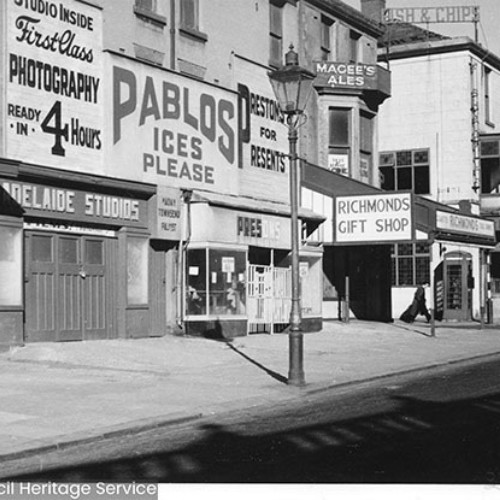 Shop fronts including Adelaide Studios, Pablos Ices, Prestons for Presents and Richmonds Gift Shop.
