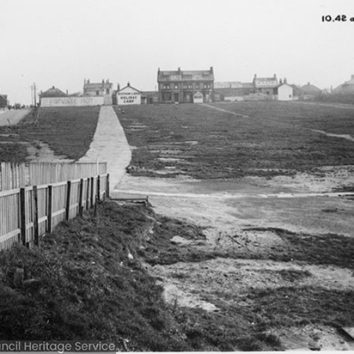 Pathway and field leading up to the Bispham Lodge Holiday Camp. To the left of the image are the houses running alongside on the adjoining street.