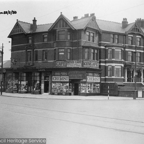 Shop fronts including Beth's Cafe and a chemist.