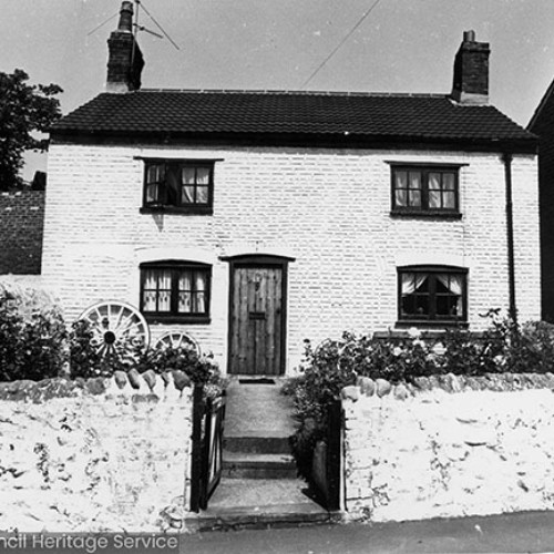 White-washed cottage.