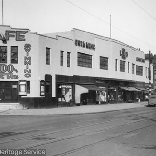 The Lido building, advertising swimming, dancing, cafe and medical baths.