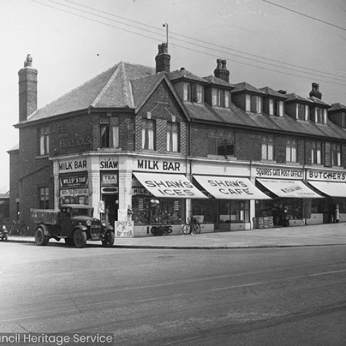 Row of shops, from left to right is the Milk Bar, Shaw's Ices, Shaw's Cafe, Squires Gate Post Office, Butchers and Cafe.