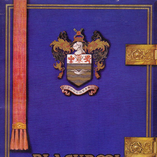 Guide book cover with town crest on a blue background. Text reads 'Blackpool Holiday Journal.'