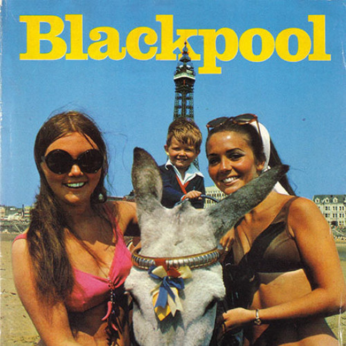 Guide book cover with photograph of donkey flanked by two women in bikinis and a child