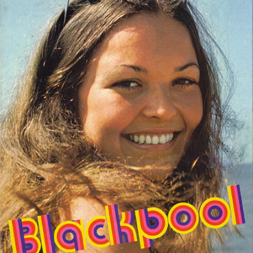 Guide book cover with close up portrait of a woman on beach. Text reads 'Blackpool is Happiness.'