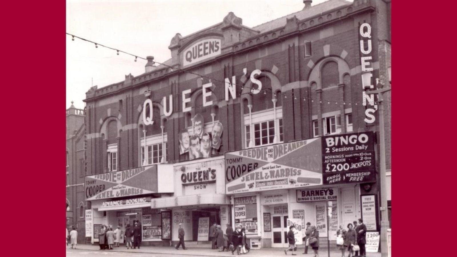 A street view of a theatre building.