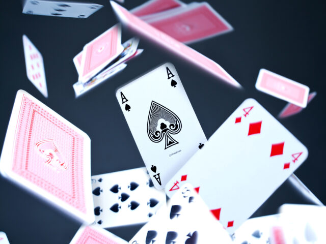 A photograph of falling playing cards