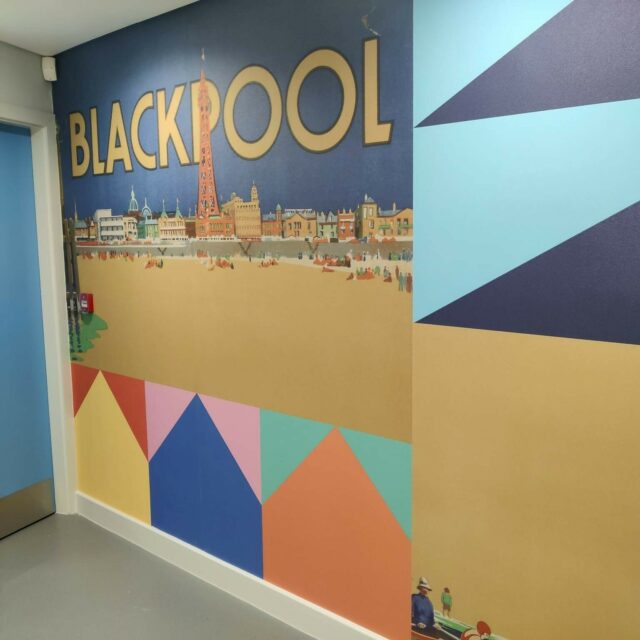 Painting of Blackpool seafront showing the tower from the beach - surrounded by Showtown blocks