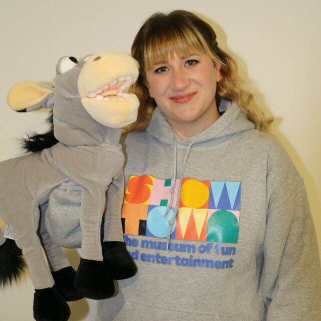 Head and shoulders shot of Steph holiday donkey puppet