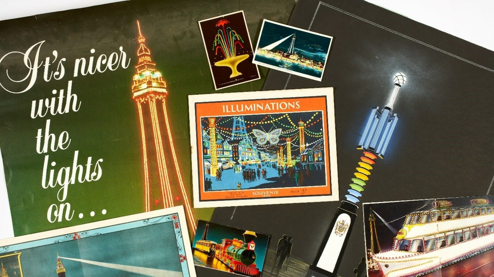 A photograph of illuminations posters and postcards  including illustrations